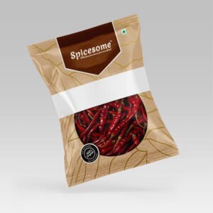 Pile of spicesome's premium whole dried red chillies in a pouch.